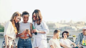 young men smartphone friendship